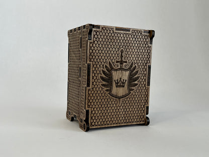 Front of dice tower with tray closed, displaying the shield and crown logo