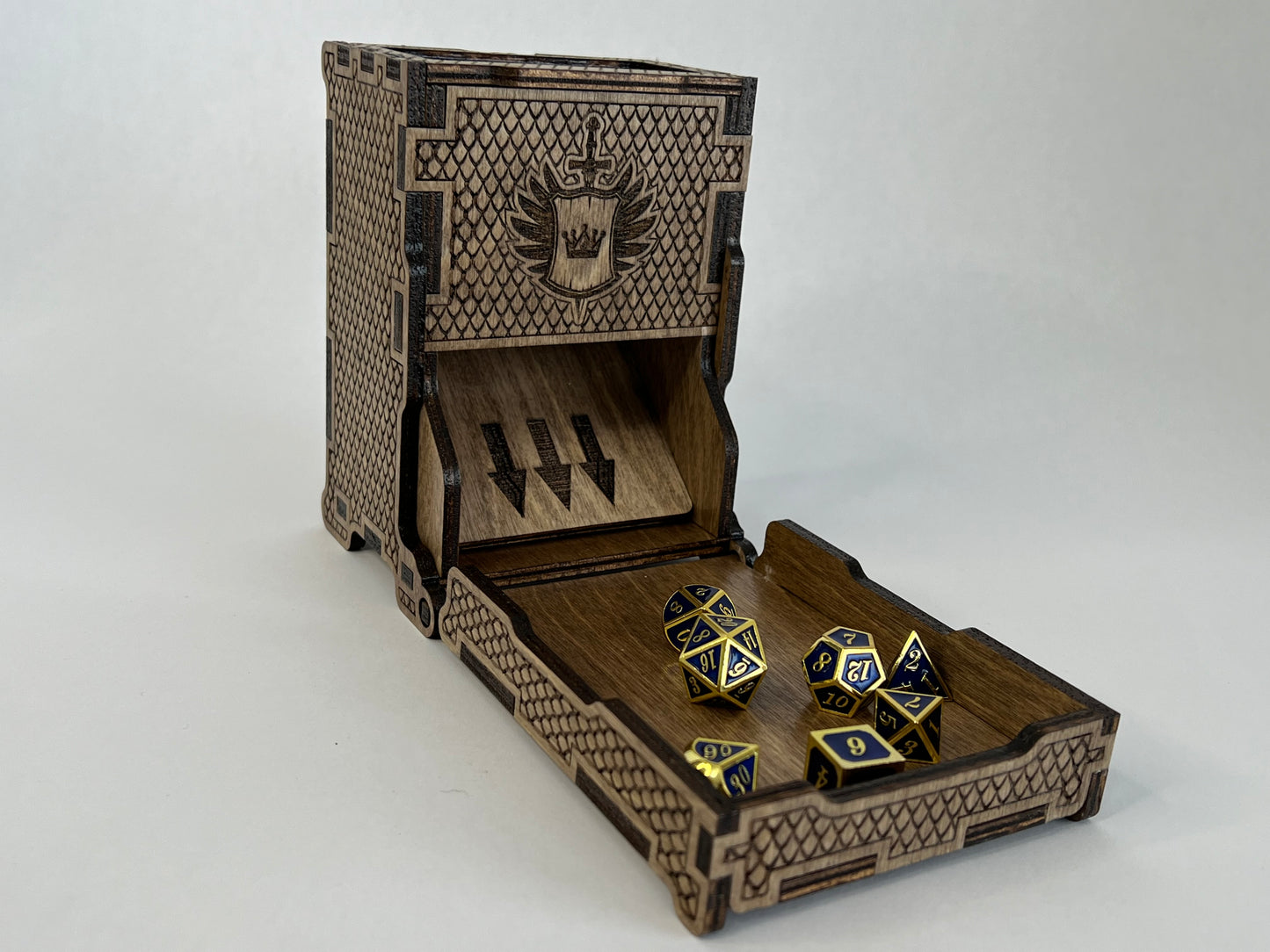 Dice tower with tray open and with dice in the tray after a roll